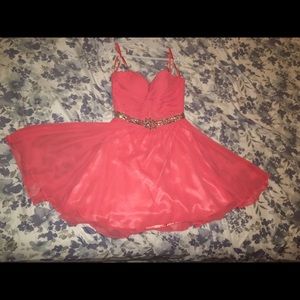 I am selling a beautiful peach dress